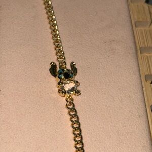 Charming Gold Bracelet with Blue Accents